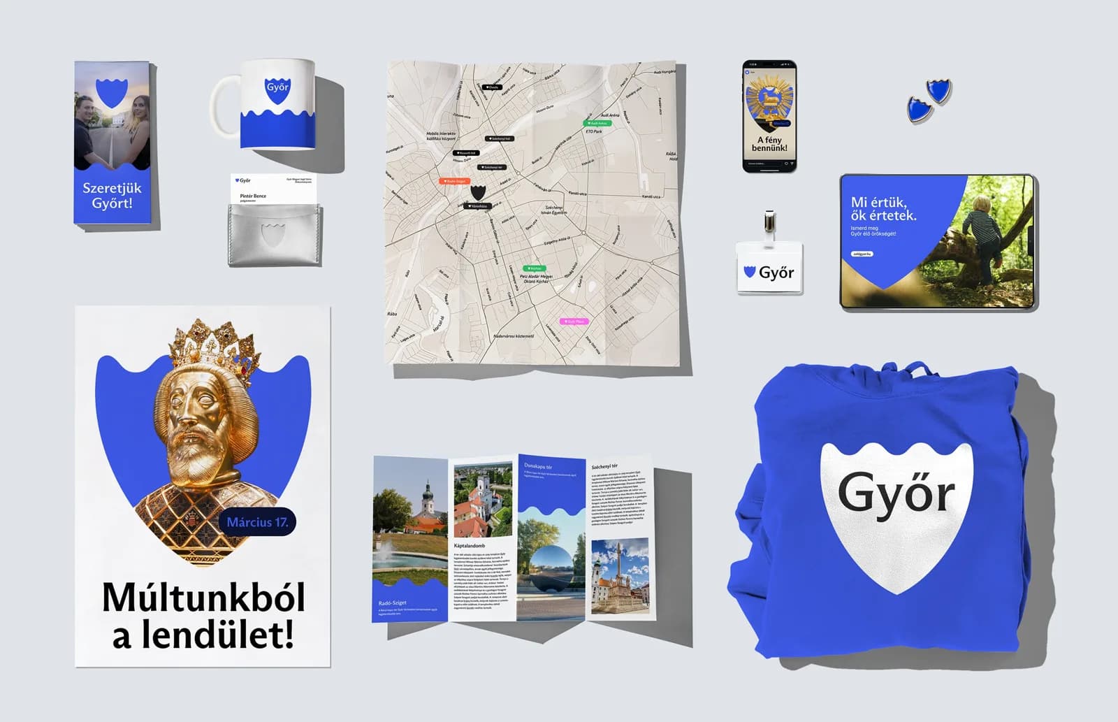 A győri arculati rendszer elemei: plakát, kiadványok, pólók, bögre